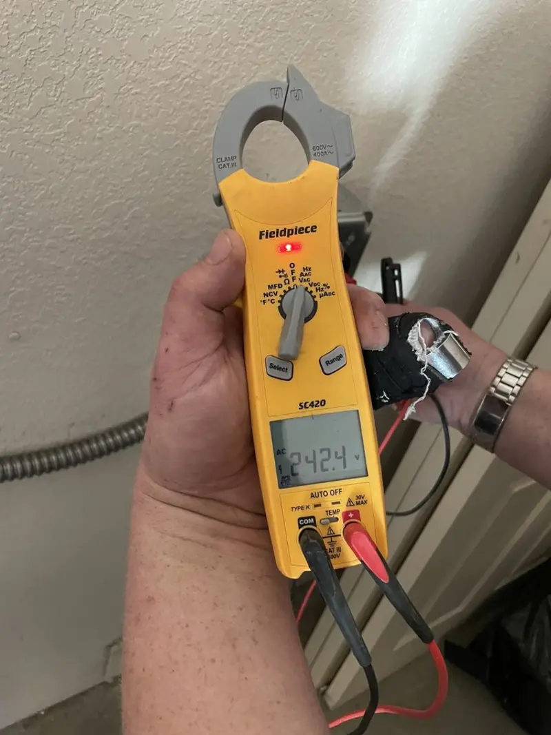 Voltage testing with clamp meter during Circuit Breaker Repair in Aberdeen